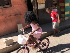 11B Three kids play on 3rd Street Trench Town Kingston Jamaica